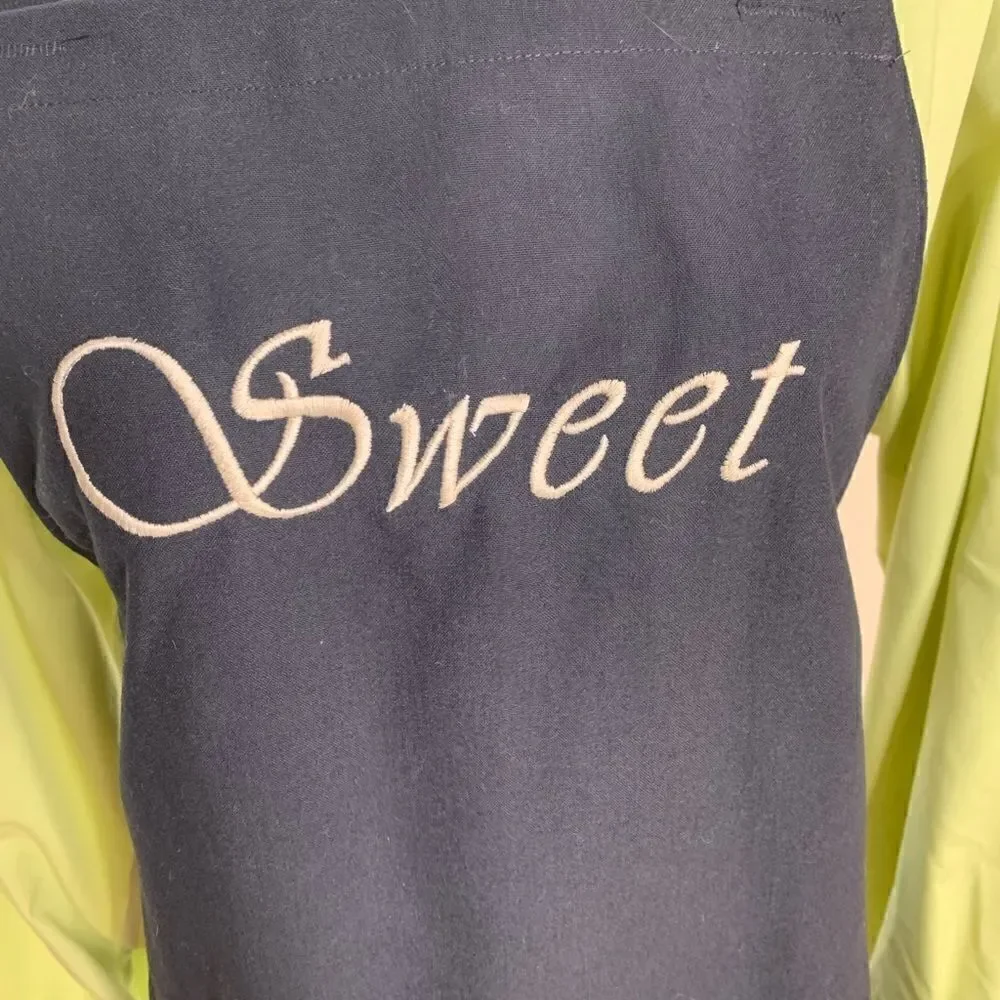 At Home with Susan Fleming personality apron “Sweet” black with tan thread